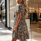 Sommerkleid für Damen mit Blumenmuster, V-Ausschnitt und kurzen Ärmeln